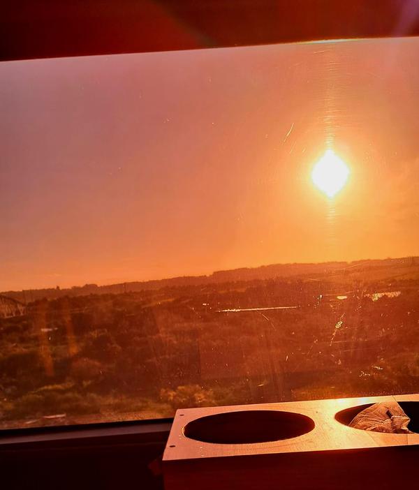 Pôr do sol visto do ônibus, no retorno da caravana de fevereiro de 2026